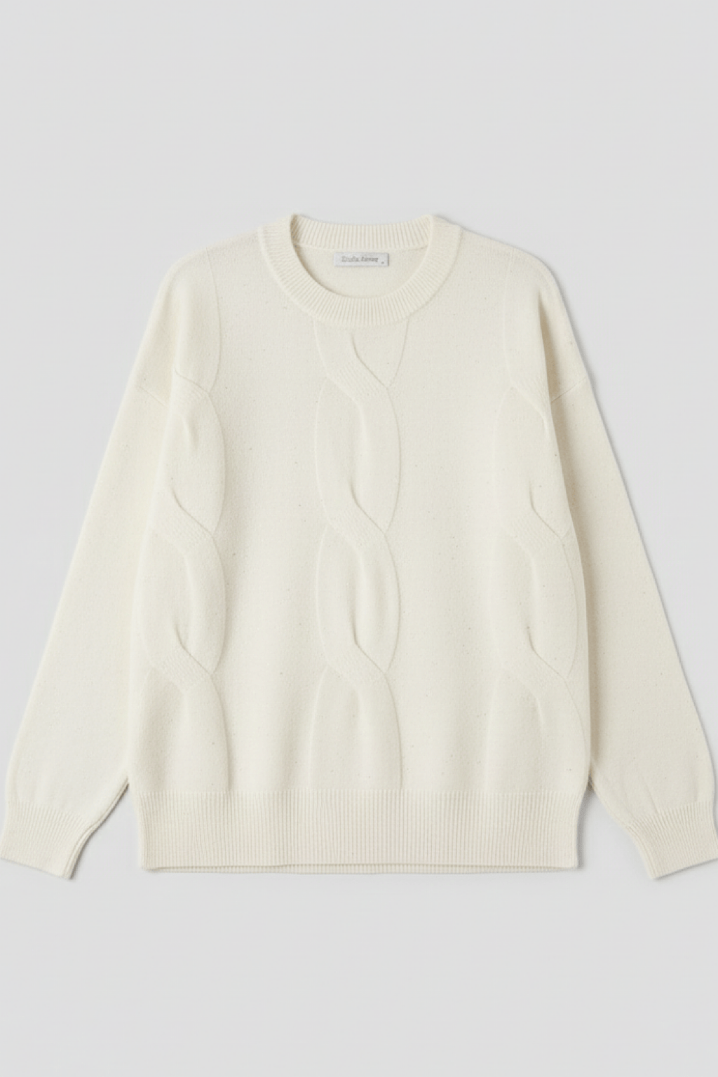 PULL EN TRICOT TORSADÉ PAILLETTÉ