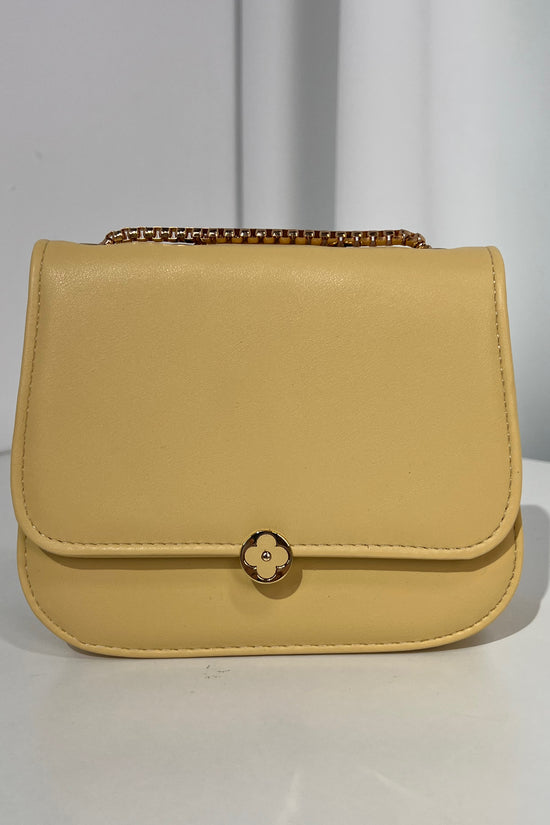 BOLSO PEQUEÑO DETALLE BOTON FLOR