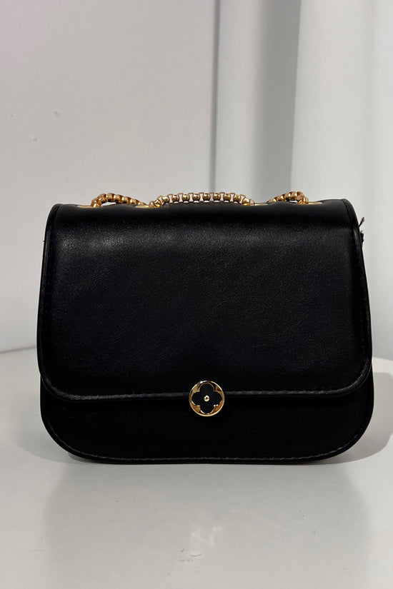 BOLSO PEQUEÑO DETALLE BOTON FLOR