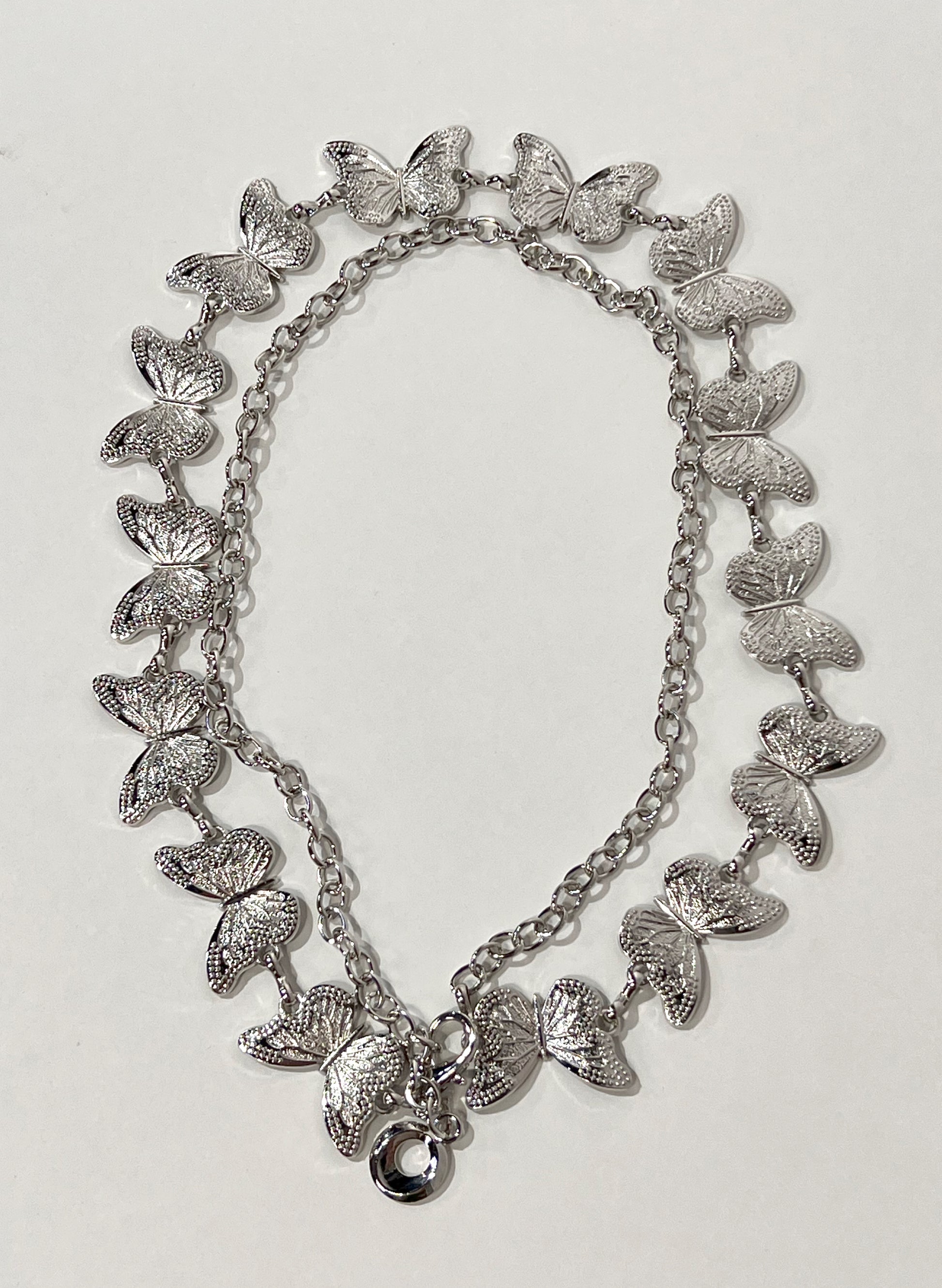 CINTURÓN METAL MARIPOSA AURA