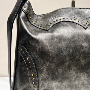 BOLSO TACHUELAS RUSH