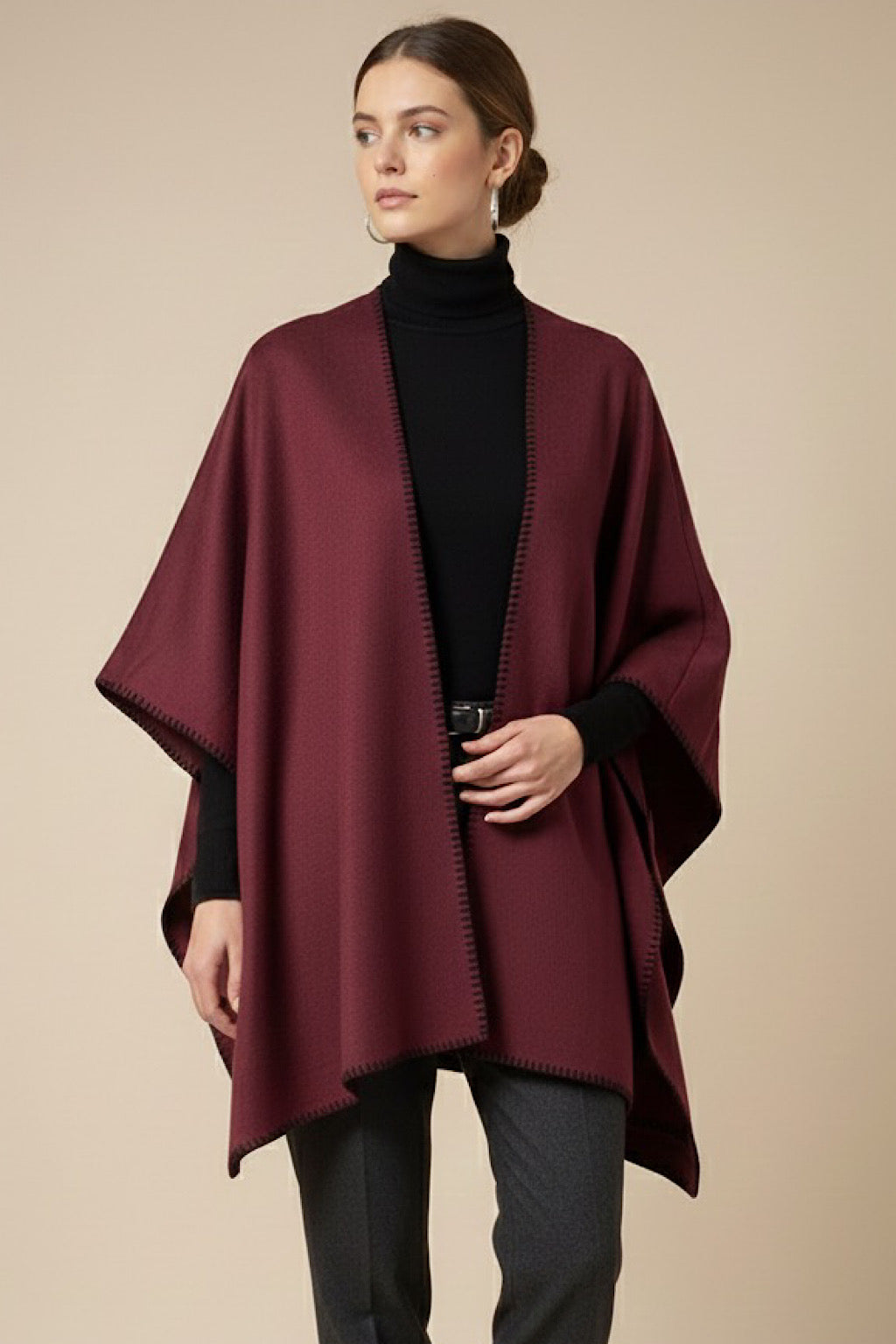 PONCHO RIBETE PESPUNTE