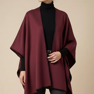 PONCHO RIBETE PESPUNTE