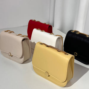 BOLSO PEQUEÑO DETALLE BOTON FLOR