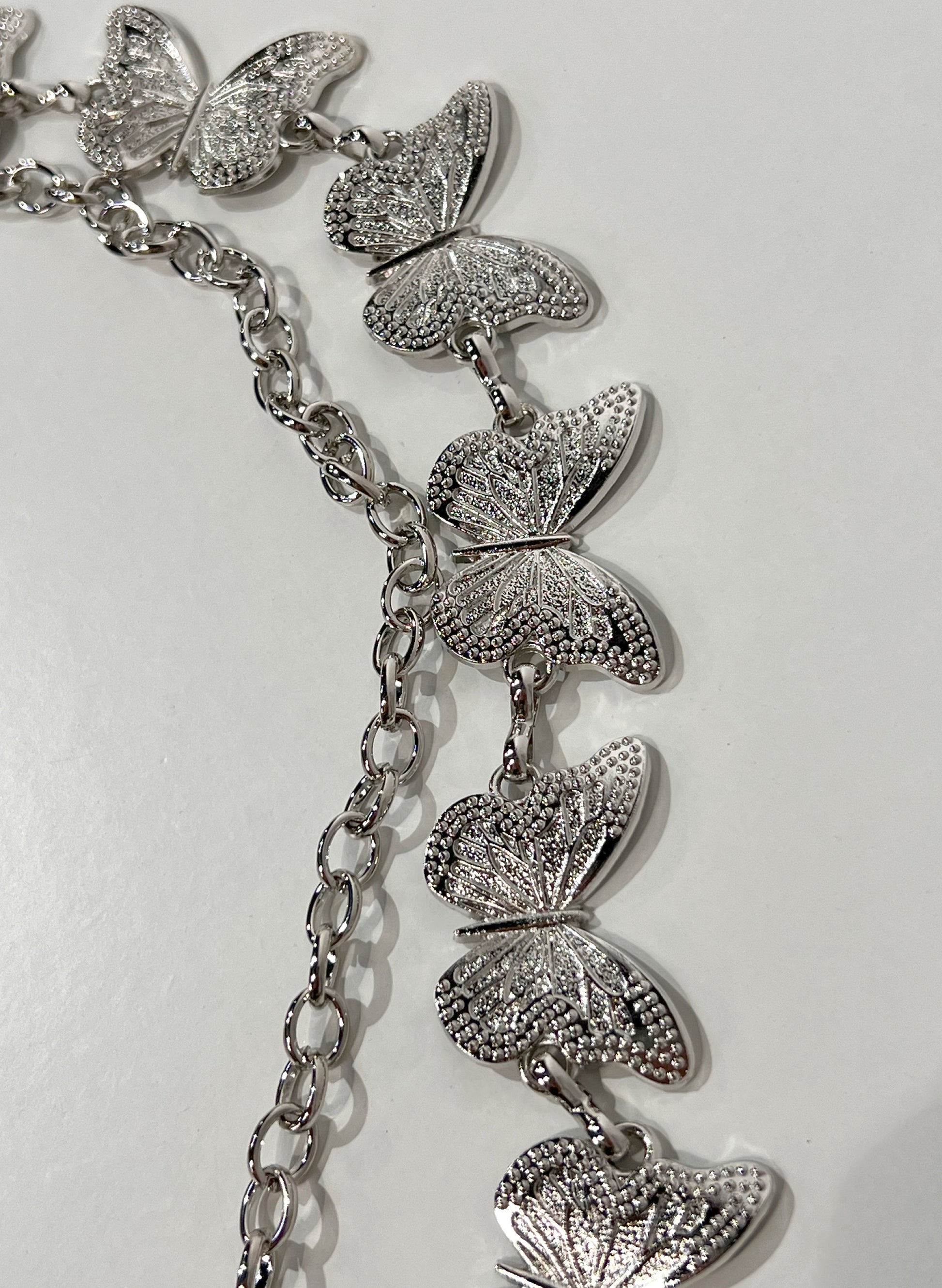 CINTURÓN METAL MARIPOSA AURA