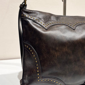 BOLSO TACHUELAS RUSH