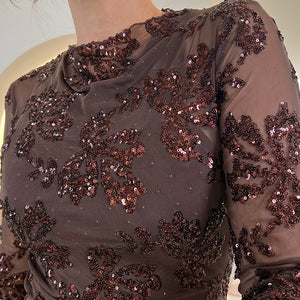 CAMISETA TRANSPARENTE CON LENTEJUELAS