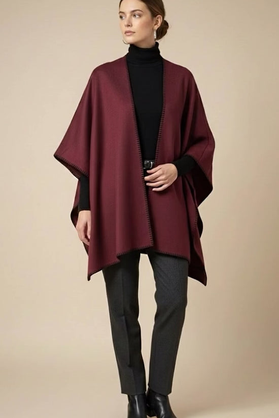 PONCHO RIBETE PESPUNTE
